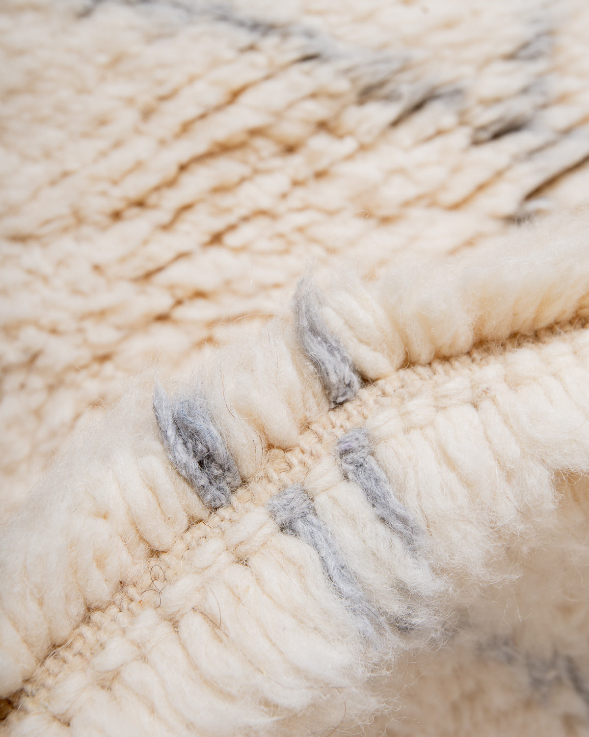 Modern, designer, handcrafted Berber rug from Morocco. Beniourain carpet with beautiful colours and patterns and fluffy wool texture.